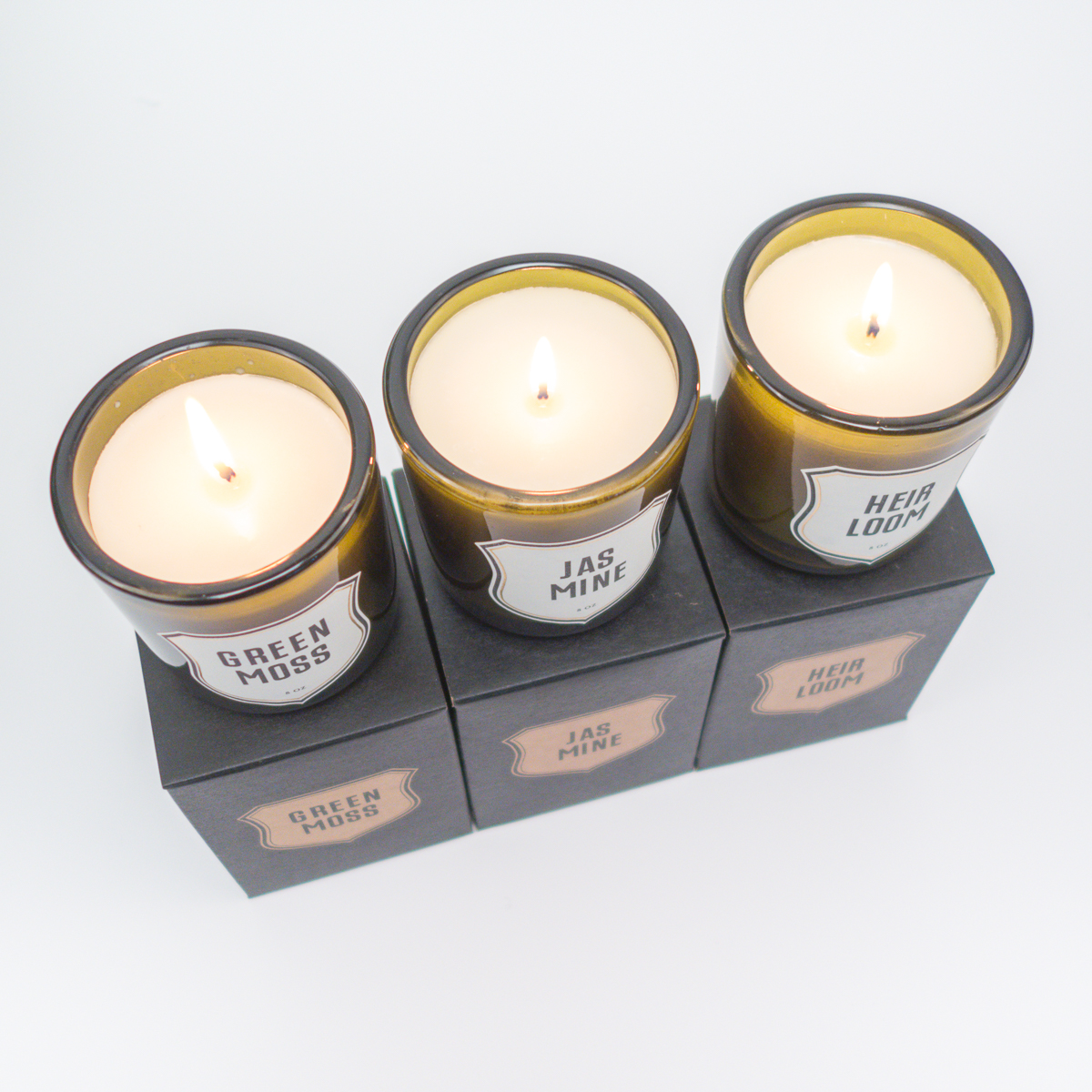 Candele profumate realizzate in vetro riciclato
